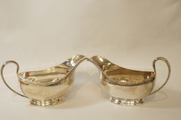 A pair of silver sauce boats, by J.B.
