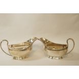 A pair of silver sauce boats, by J.B.