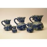 A set of five late 20th century graduated Masons ironstone style hexagonal jugs printed in blue