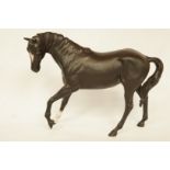 A Beswick palomino horse, 11.