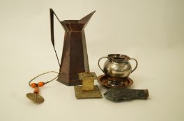 An early 20th century hexagonal copper jug, 27.