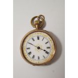 A fob watch, stamped '9K', with enamel dial and four piece hinged case, metal cuvette,