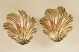 A pair of late Victorian silver shell salts, by William Hutton & Sons Ltd, London 1895,