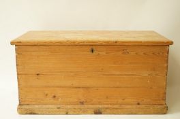 A pine blanket box, with two iron handles,