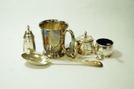 A silver mug by Edward Viner, Sheffield 1928; a three piece silver cruet set, Birmingham 1948,
