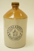 A DTJ Lyle of Maidstone large ginger beer and lemonade stone jar with loop handle and screw top,