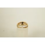 A sapphire and diamond 9 carat gold ring, finger size K, 1.