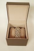 A paste bracelet, set in white metal to elastic,