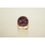 An amethyst ring, stamped '9ct', finger size K,