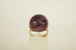 An amethyst ring, stamped '9ct', finger size K,