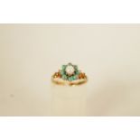 A turquoise and cultured pearl 9ct gold cluster ring, finger size M, 1.