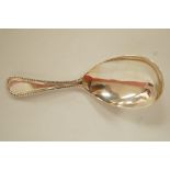 A silver caddy spoon, by James W. Potter & Sons, London, bead pattern, 9.5cm long, 18.