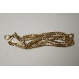 A Victorian chain, of baton links with batons between double round links, 86cm long,