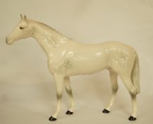 A Beswick figure of a dapple grey racehorse, printed marks in black,