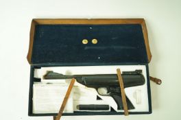 A BSA Scorpion air gun in associated leather case with brass plaque