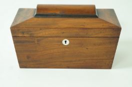 A 19th century mahogany sarcophagus shaped tea caddy,