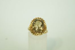 A smokey quartz 9ct gold dress ring, finger size M, 4.