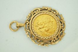 An Elizabeth II gold sovereign 1968, in a 9 carat gold fancy pendant mount, 14.