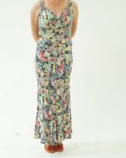 A vintage 1950s full length floral dress,