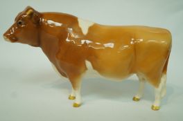 A Beswick model of a Guernsey bull, printed marks in black, 12.