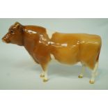 A Beswick model of a Guernsey bull, printed marks in black, 12.