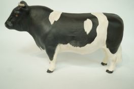A Beswick model of a Friesian bull, printed marks in black,
