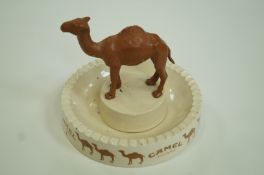 A large decorative advertising ashtray for camel cigarettes,