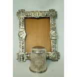 A late Victorian silver photograph frame, London 1881, 20 cm by 15.5 cm, image area 13 cm by 9.