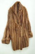 A ladies fur jacket,