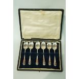 A set of six silver spoons, by Harrison Fisher & Co, Sheffield 1914, old English and shell pattern,