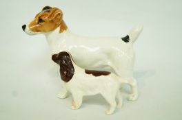 A Beswick model of a Spaniel and a Jack Russell Terrier,