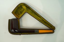 A Meershaum pipe in original leather case, marked Ambre Pur Garanti, with silver plated collar,