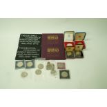 A collection of various coins including cased decimal coinage