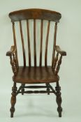 A 20th century mahogany armchair,