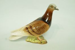 A Beswick model, figure of a two stripe pigeon, moulded factory marks no 1383,