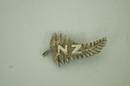 A New Zealand fern badge, by J R Garunt of London,