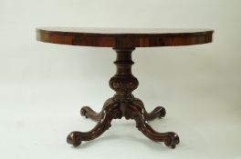 A 19th century rosewood breakfast table on four outswept legs, 71cm high,
