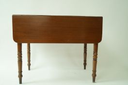 A 19th century mahogany Pembroke table with one frieze drawer on turned and tapering legs,