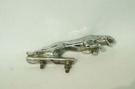 A Jaguar car mascot with two screw attachments, 12.
