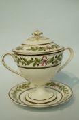 A Wedgwood creamware two handled cup, cover and saucer, painted with oak leaves, impressed marks,