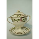 A Wedgwood creamware two handled cup, cover and saucer, painted with oak leaves, impressed marks,