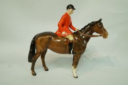 A Beswick model of a huntsman mounted, printed marks in black,