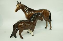A Beswick model of a bay horse. printed marks in blacks, 20.