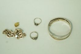 A collection of silver jewellery, comprising a bracelet,