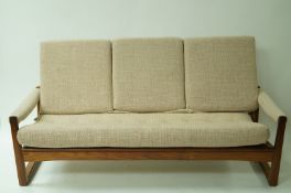 A teak three seater G Plan sofa, 87cm high, 176cm long, 74cm deep,