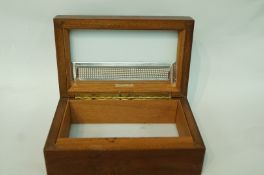A 20th century mahogany humidor, with applied label for Alfred Dunhill,