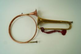 A French horn, 32cm diameter and a brass bugle by Mayers and Harrison, Manchester,