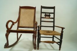 A mahogany rocking chair with cane seat and back, 99cm high, along with a rush seat chair,