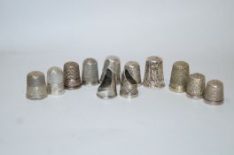 A small collection of thirteen thimbles,