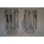 A pair of Victorian glass table lusters, each of flared form suspending ten cut glass drops,